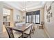 Bright dining area with a wood table and chairs, near the kitchen at 2415 W Weatherby Way, Chandler, AZ 85286