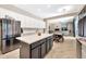 Eat-in kitchen, featuring an island and stainless steel appliances at 2415 W Weatherby Way, Chandler, AZ 85286