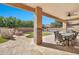 Spacious covered patio with dining area and backyard view at 2415 W Weatherby Way, Chandler, AZ 85286