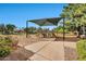 Playground with slides, climbing structures, and shade at 2415 W Weatherby Way, Chandler, AZ 85286