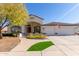 Beautiful single-story home with a landscaped front yard and two-car garage at 3121 S Verde Cir, Mesa, AZ 85212