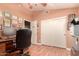 Home office features built-in shelving and large closet at 3121 S Verde Cir, Mesa, AZ 85212