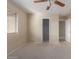 Bright bedroom with carpeted floor and ceiling fan at 319 E Palomino Way, San Tan Valley, AZ 85143