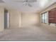 Primary bedroom with ceiling fan and ample space at 319 E Palomino Way, San Tan Valley, AZ 85143