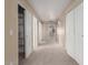 Hallway with carpet flooring and linen closet at 319 E Palomino Way, San Tan Valley, AZ 85143