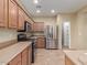 Kitchen with stainless steel appliances and pantry at 319 E Palomino Way, San Tan Valley, AZ 85143