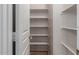 Walk-in pantry with adjustable shelving at 319 E Palomino Way, San Tan Valley, AZ 85143