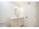 Bright bathroom with white vanity and modern fixtures at 342 E Orangewood Ave, Phoenix, AZ 85020