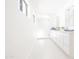 Modern bathroom with double sinks, glass shower, and contemporary design at 342 E Orangewood Ave, Phoenix, AZ 85020