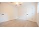 Spacious bedroom featuring hardwood floors and ceiling fan at 342 E Orangewood Ave, Phoenix, AZ 85020