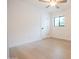 Spacious bedroom with hardwood floors and ceiling fan at 342 E Orangewood Ave, Phoenix, AZ 85020