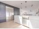 Modern kitchen with stainless steel appliances, stylish white countertops and lots of cabinet space at 342 E Orangewood Ave, Phoenix, AZ 85020