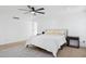 Primary bedroom offers a ceiling fan, an area rug, and two side tables at 342 E Orangewood Ave, Phoenix, AZ 85020