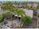 Expansive backyard features a water fountain, seating and dining areas, mature trees and a beautiful desert landscape at 3799 N 154Th Dr, Goodyear, AZ 85395