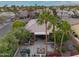 An outdoor space featuring a large patio, fireplace, multiple seating areas and a beautiful water fountain at 3799 N 154Th Dr, Goodyear, AZ 85395