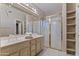 Bathroom with double sinks and glass door shower at 3799 N 154Th Dr, Goodyear, AZ 85395