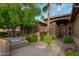 Home entry with walkway, seating area, and landscaping at 3799 N 154Th Dr, Goodyear, AZ 85395