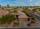 Charming single-story home boasting desert landscaping, mature trees, and a two-car garage in a desirable neighborhood at 3799 N 154Th Dr, Goodyear, AZ 85395