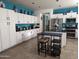 Spacious kitchen with ample cabinetry, an island, and stainless steel appliances at 400 W Wisteria Pl, Chandler, AZ 85248