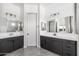 Double vanity bathroom with a modern design and ample counter space at 6659 N 127Th Dr, Glendale, AZ 85307