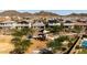 Aerial view of community with playground, pool, and homes with solar panels at 7250 W Pinnacle Vista Dr, Peoria, AZ 85383