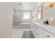 Spa-like bathroom with a soaking tub, glass shower, and modern finishes at 7250 W Pinnacle Vista Dr, Peoria, AZ 85383