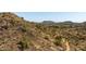 View of a desert landscape with mountains and hiking trails at 7250 W Pinnacle Vista Dr, Peoria, AZ 85383