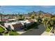 An aerial view showcasing a single-story home with a private driveway and lush landscaping at 7343 E Marlette Ave, Scottsdale, AZ 85250