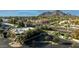 Aerial view of a building with ample parking and mountain backdrop at 7343 E Marlette Ave, Scottsdale, AZ 85250