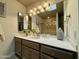 Bathroom with updated vanity, mirror, and ample storage at 7343 E Marlette Ave, Scottsdale, AZ 85250