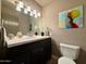 Clean bathroom with single sink and toilet at 7343 E Marlette Ave, Scottsdale, AZ 85250