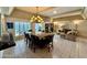 Elegant dining area with a large table perfect for entertaining, adjacent to a living room at 7343 E Marlette Ave, Scottsdale, AZ 85250