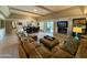 Bright and spacious living room featuring a fireplace, comfortable seating and dining area at 7343 E Marlette Ave, Scottsdale, AZ 85250