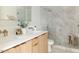 Spa-like bathroom with marble tile and double vanity at 8437 E San Miguel Ave, Scottsdale, AZ 85250