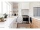 Modern kitchen with stainless steel appliances and white shaker cabinets at 8437 E San Miguel Ave, Scottsdale, AZ 85250