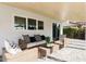 Relaxing patio area with wicker furniture and wood ceiling at 8437 E San Miguel Ave, Scottsdale, AZ 85250