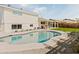 Inviting kidney-shaped pool with a patio and landscaping at 8437 E San Miguel Ave, Scottsdale, AZ 85250