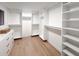 Spacious walk-in closet with ample shelving and hanging space at 8437 E San Miguel Ave, Scottsdale, AZ 85250