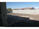 Large backyard with gravel and a small paved patio area at 8808 W State Ave, Glendale, AZ 85305