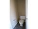 Small half bathroom with toilet and tile flooring at 8808 W State Ave, Glendale, AZ 85305