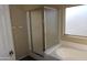 Bathroom with shower stall and a bathtub at 8808 W State Ave, Glendale, AZ 85305