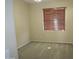 Well-lit bedroom with carpet flooring and window coverings at 8808 W State Ave, Glendale, AZ 85305