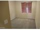 Simple bedroom with carpeted floor and window coverings at 8808 W State Ave, Glendale, AZ 85305