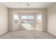 Comfortable bedroom featuring a large bay window providing lots of natural light and a peaceful ambiance at 8808 W State Ave, Glendale, AZ 85305