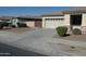 House exterior with driveway and landscaping at 8808 W State Ave, Glendale, AZ 85305