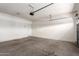 This is a spacious two car garage with a cement floor and plenty of room for storage at 8808 W State Ave, Glendale, AZ 85305