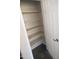 Empty pantry with four shelves for storage at 8808 W State Ave, Glendale, AZ 85305