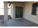 Covered patio with sliding glass door access at 8808 W State Ave, Glendale, AZ 85305