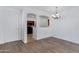 Dining room with hardwood floors and kitchen access at 931 S Porter Ct, Gilbert, AZ 85296