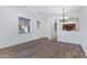 Dining room with hardwood floors and kitchen view at 931 S Porter Ct, Gilbert, AZ 85296